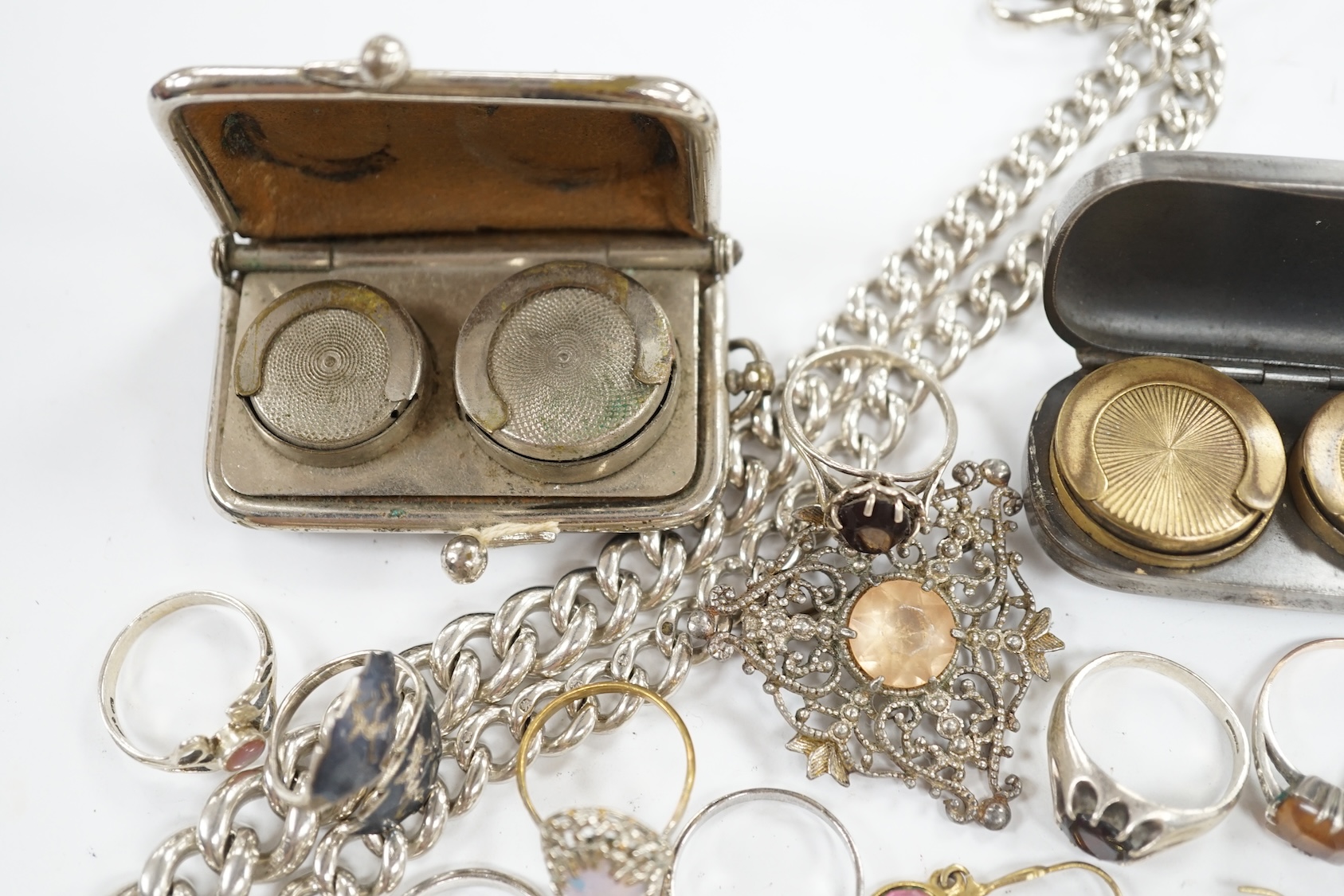 A silver graduated curb link albert, 41cm, two base metal sovereign cases and a small collection of assorted jewellery including silver and white metal rings. Condition - poor to fair to good